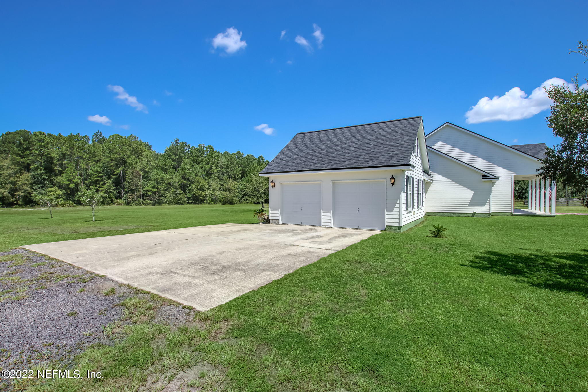 12410 County Road 121 Bryceville, FL 32009 - Photo 32 of 34 a view of a house with a yard