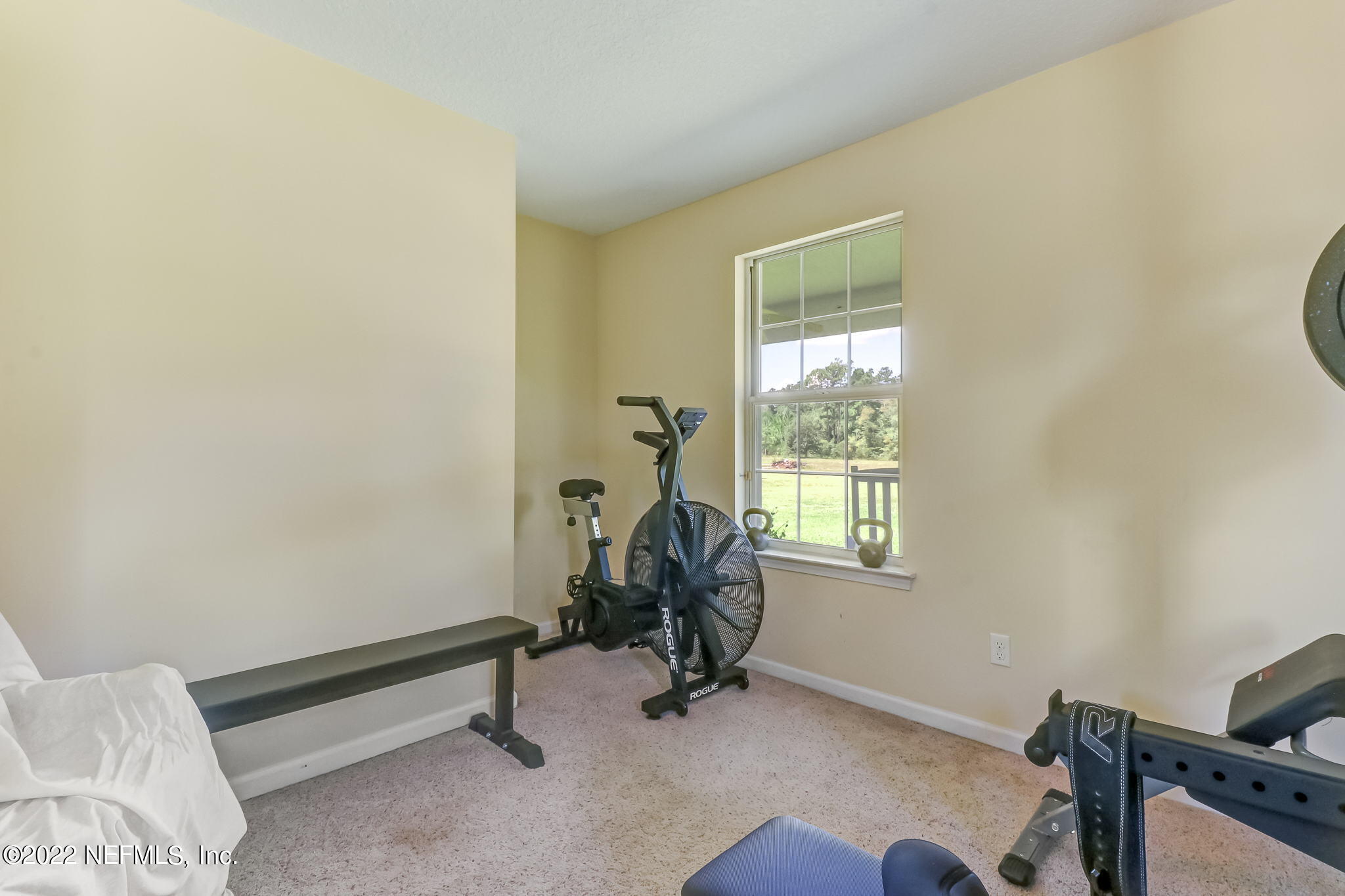 12410 County Road 121 Bryceville, FL 32009 - Photo 34 of 34 a room with gym equipment and a window