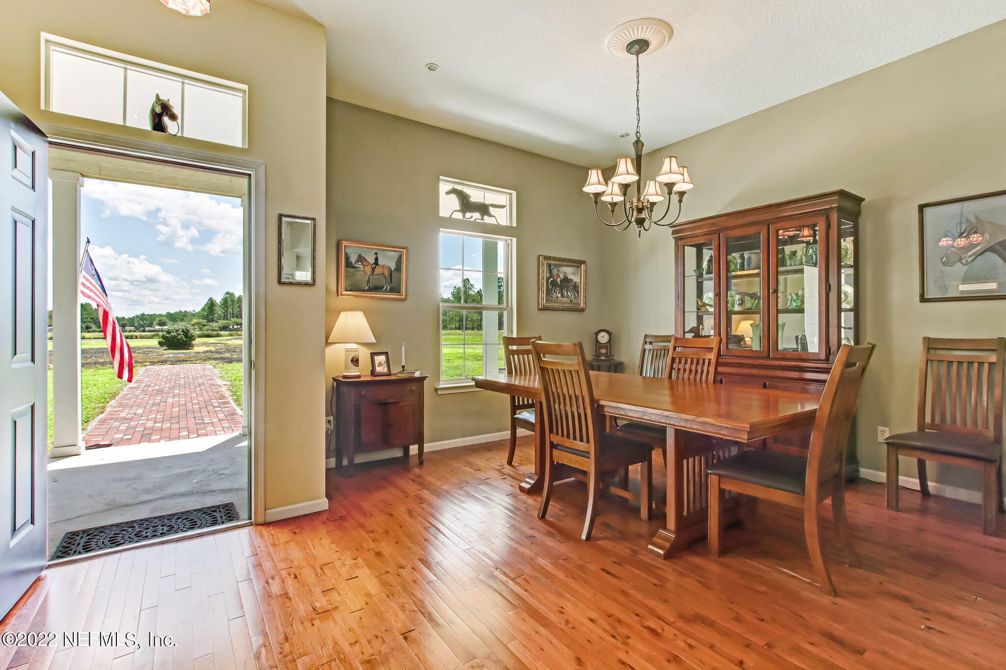 12410 County Road 121 Bryceville, FL 32009 - Photo 5 of 34 a view of a dining room with furniture window and wooden floor