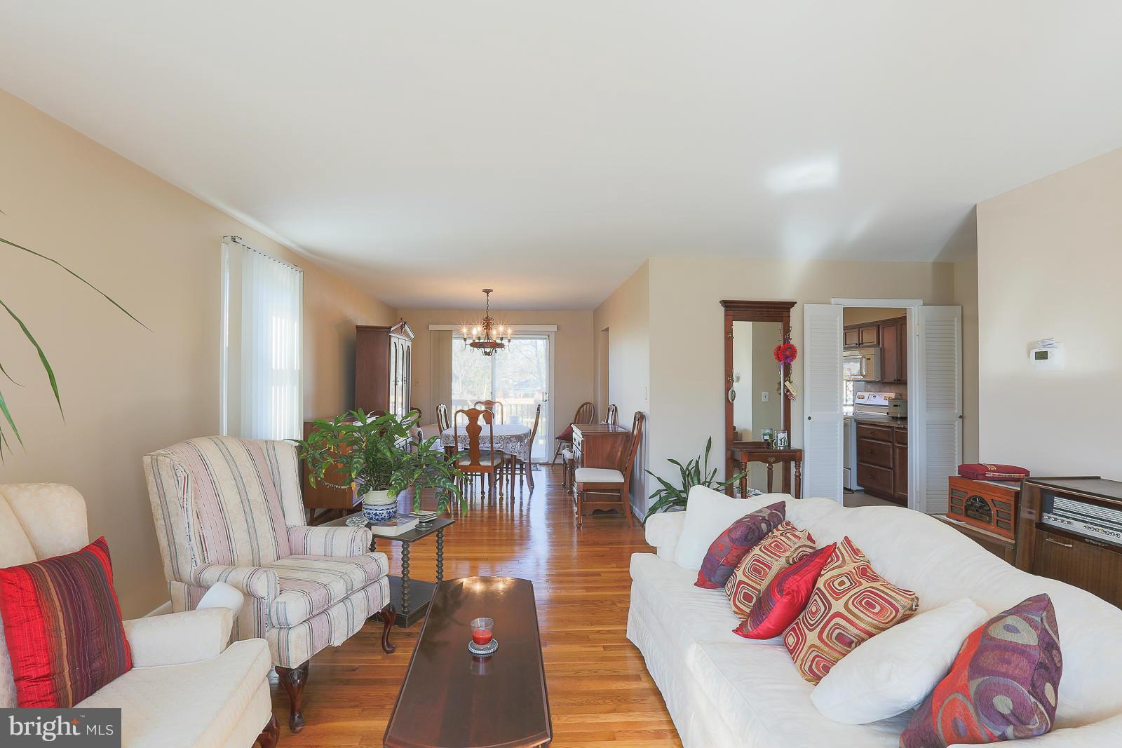 3834 Cherrybrook Road Randallstown, MD 21133 - Photo 3 of 30 a living room with furniture potted plant and a large window