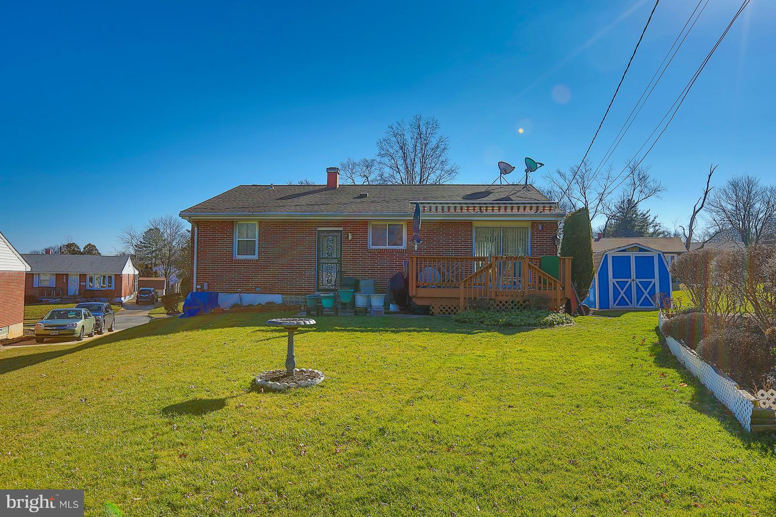 3834 Cherrybrook Road Randallstown, MD 21133 - Photo 27 of 30 a front view of a house with a yard