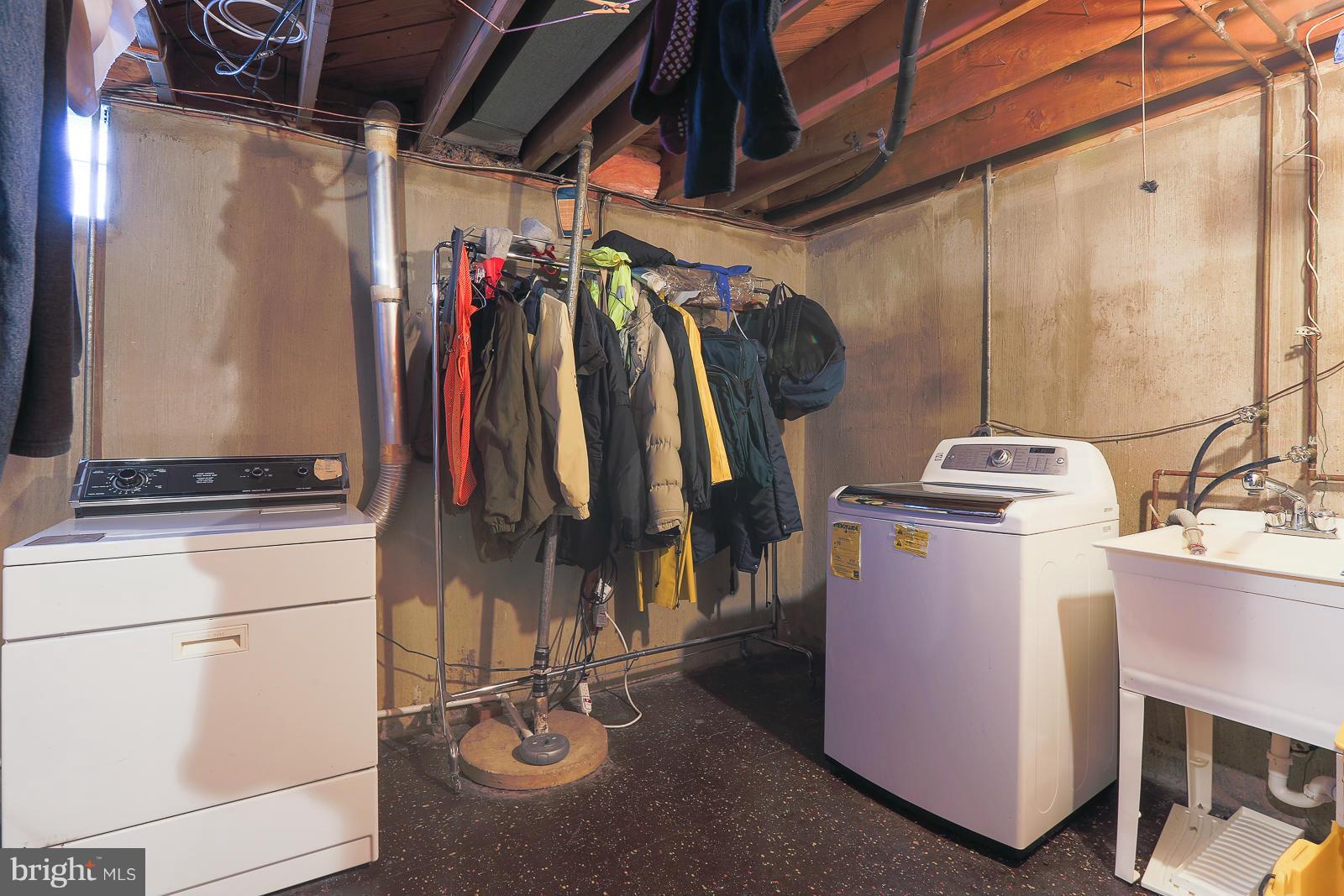 3834 Cherrybrook Road Randallstown, MD 21133 - Photo 30 of 30 a view of walk in closet with clothes and shoes