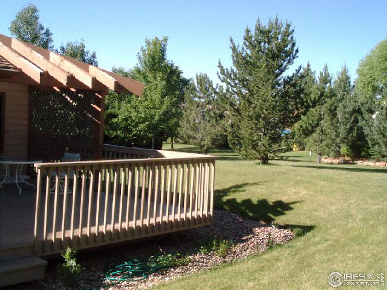 7225 Four Rivers Road Boulder, CO 80301 - Photo 5 of 6 a view of a yard with iron fence