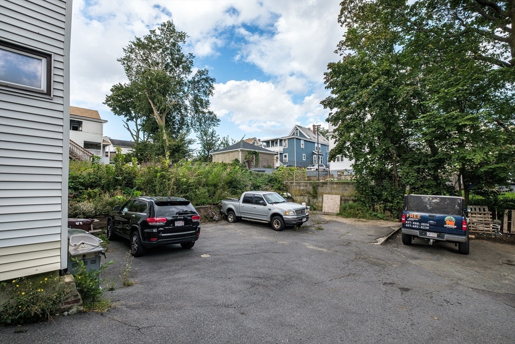 20 Hatch Street Everett, MA 02149 - Photo 16 of 16 a view of car parked in front of a house