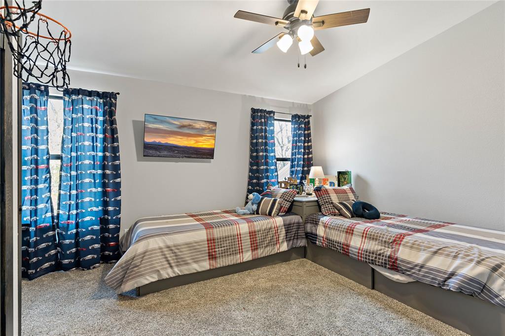 8127 Fm 910 Bogata, TX 75417 - Photo 14 of 22 a bedroom with bed and window