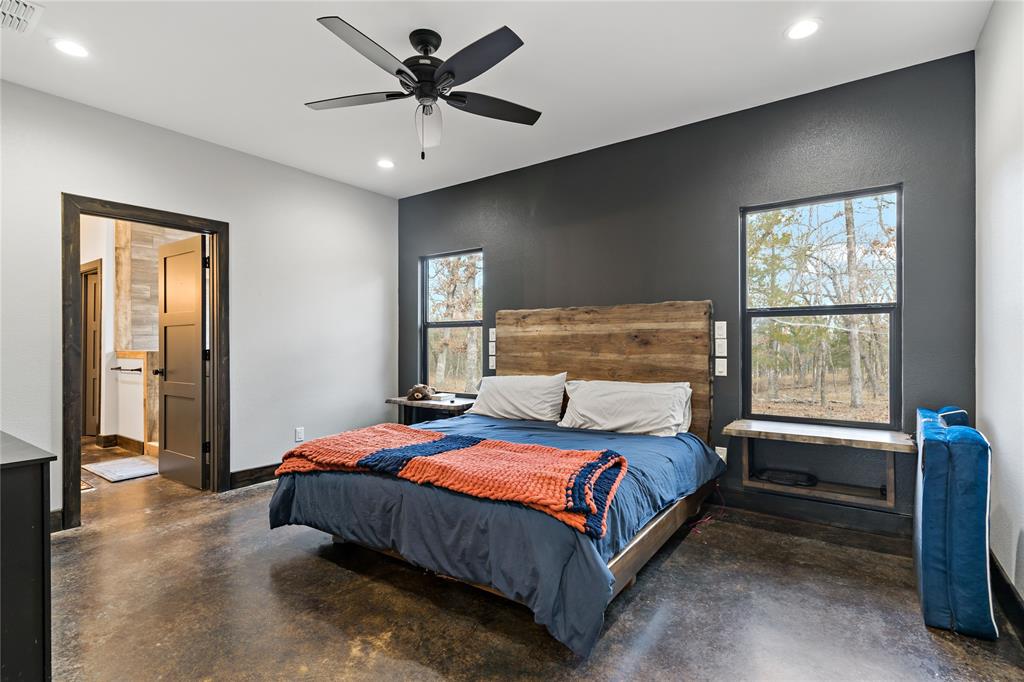 8127 Fm 910 Bogata, TX 75417 - Photo 8 of 22 a bedroom with a bed and a window