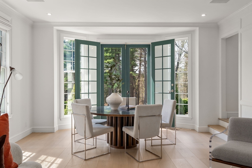 389 Grove Street Needham, MA 02492 - Photo 7 of 40 a dining room with furniture and large windows