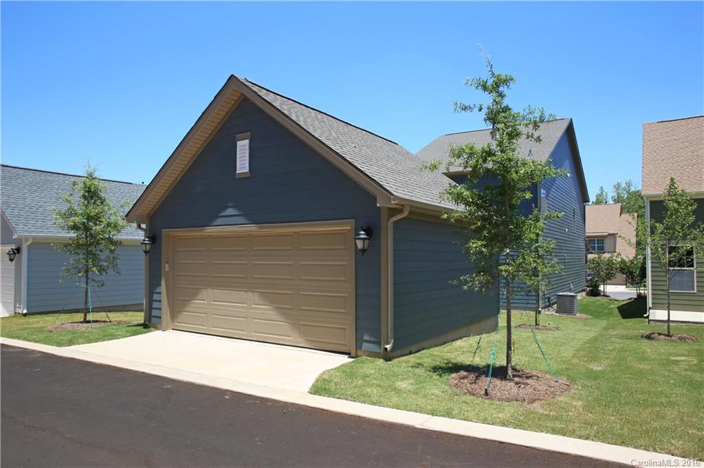 132 Helton Lane, Unit 38 Fort Mill, SC 29708 - Photo 11 of 23 a house that has a tree in front of it