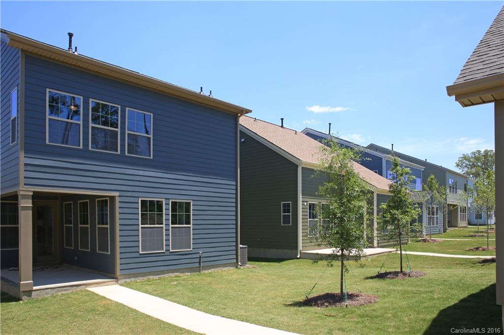 132 Helton Lane, Unit 38 Fort Mill, SC 29708 - Photo 12 of 23 a front view of a house with a yard