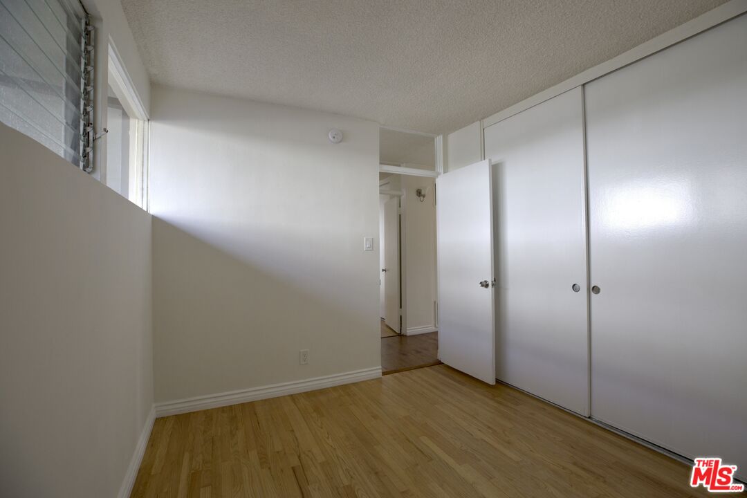 11131 Rose Avenue, Unit 13 Los Angeles, CA 90034 - Photo 10 of 17 a view of an empty room