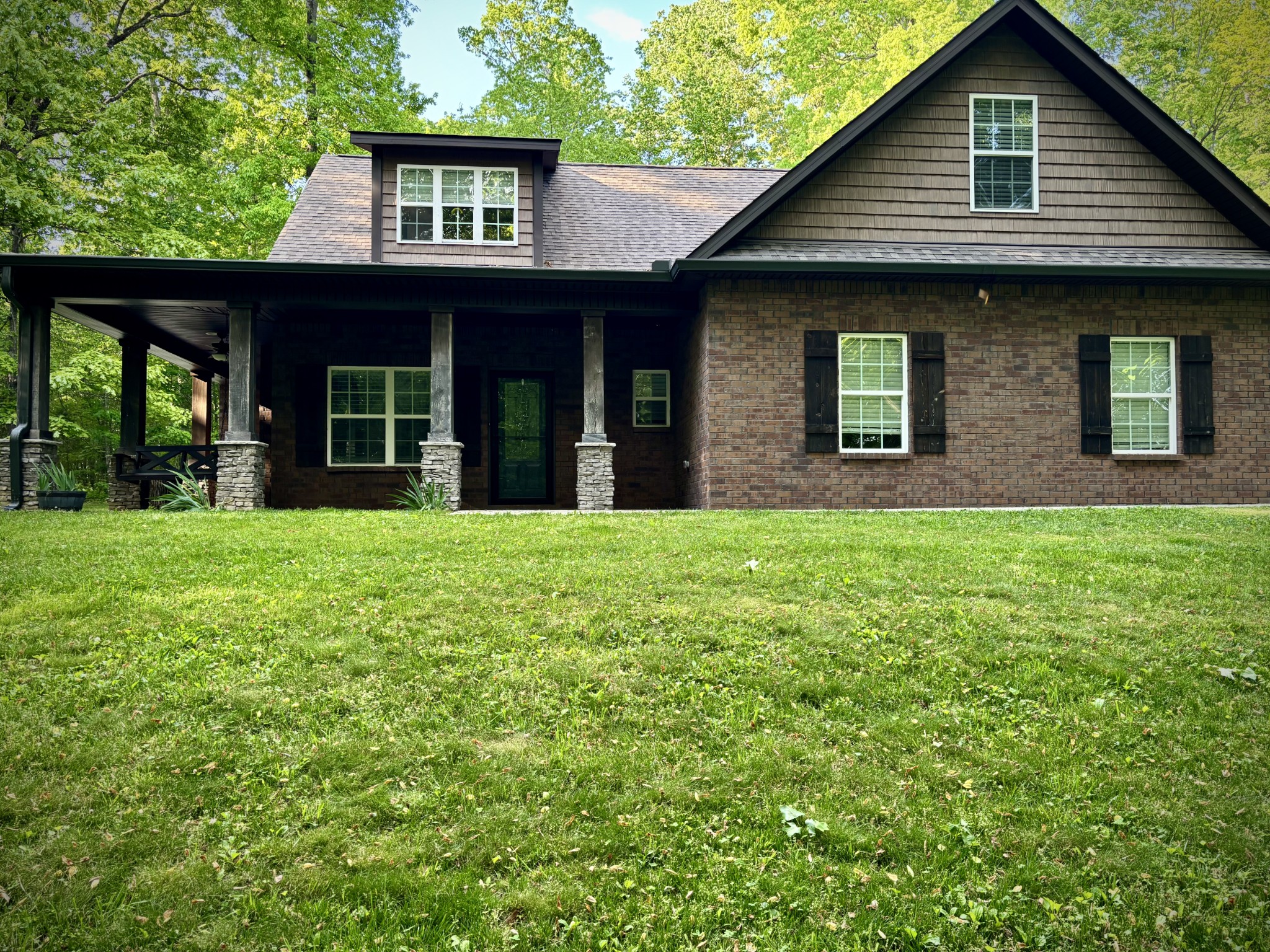 65 Sheltontown Road Manchester, TN 37355 - Photo 3 of 17 a view of a house with yard and garden