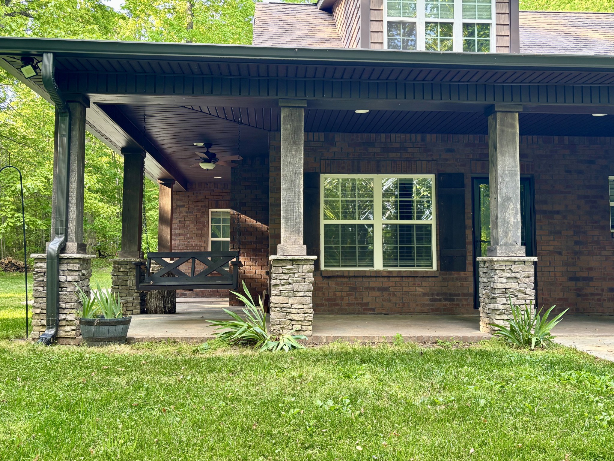 65 Sheltontown Road Manchester, TN 37355 - Photo 5 of 17 a view of house with backyard outdoor seating and green space