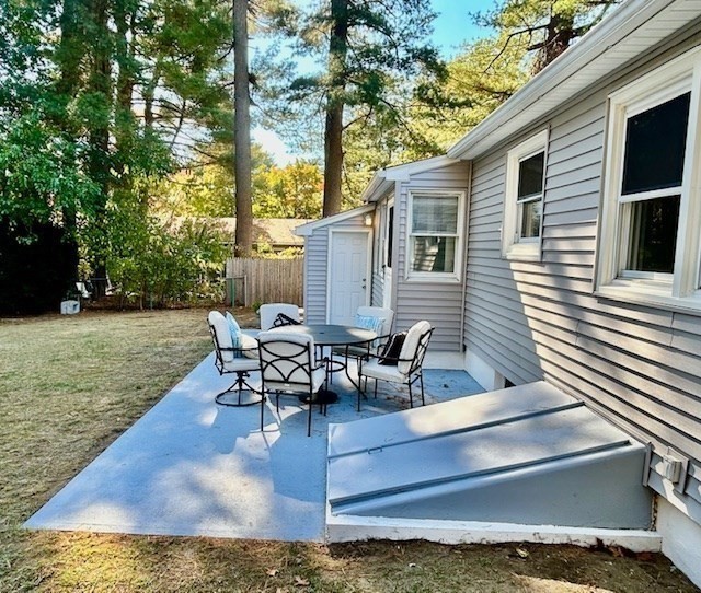 15 Garcia Street Springfield, MA 01129 - Photo 3 of 11 a view of a backyard with sitting area