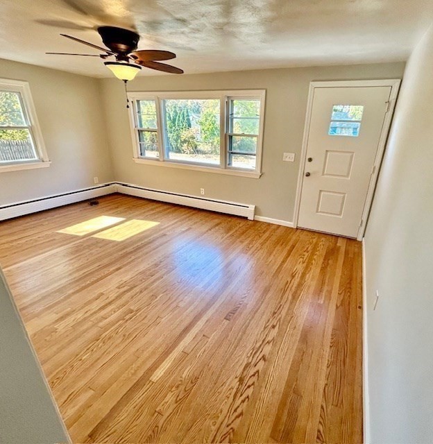 15 Garcia Street Springfield, MA 01129 - Photo 7 of 11 a view of empty room with wooden floor and fan