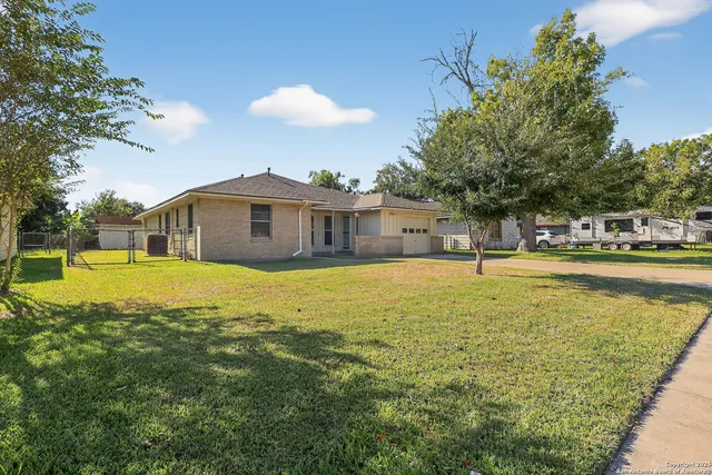 a view of a house with a swimming pool