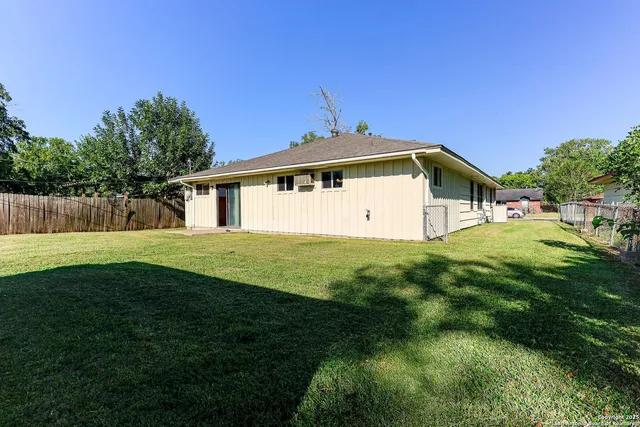 a front view of house with garden