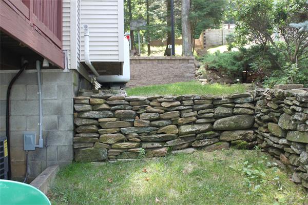 1 Island Road Holland, MA 01521 - Photo 18 of 30 a backyard of a house with lots of green space