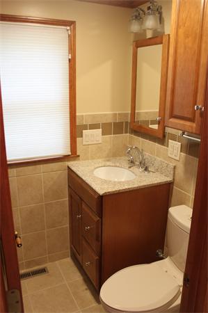 1 Island Road Holland, MA 01521 - Photo 22 of 30 a bathroom with a sink mirror vanity and toilet