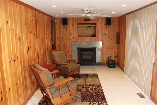 1 Island Road Holland, MA 01521 - Photo 30 of 30 a living room with furniture and a fireplace