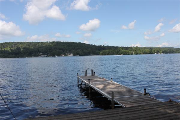 1 Island Road Holland, MA 01521 - Photo 3 of 30 a view of a lake with houses in the back