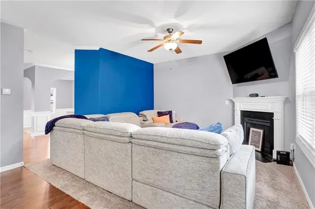 a kitchen with stainless steel appliances granite countertop a refrigerator stove microwave and sink