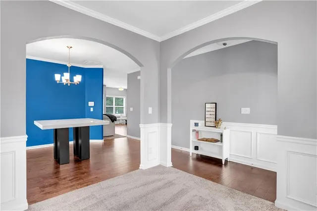 a living room with a fireplace furniture and a flat screen tv