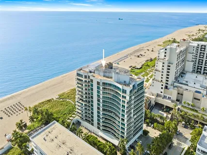 a view of balcony with wooden floor