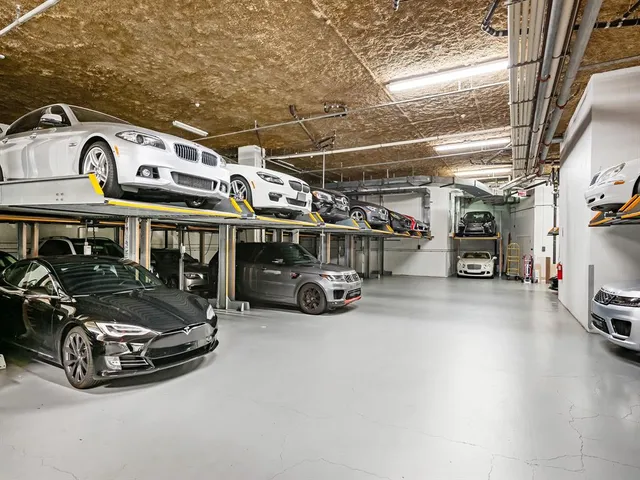 a view of parking garage with cars