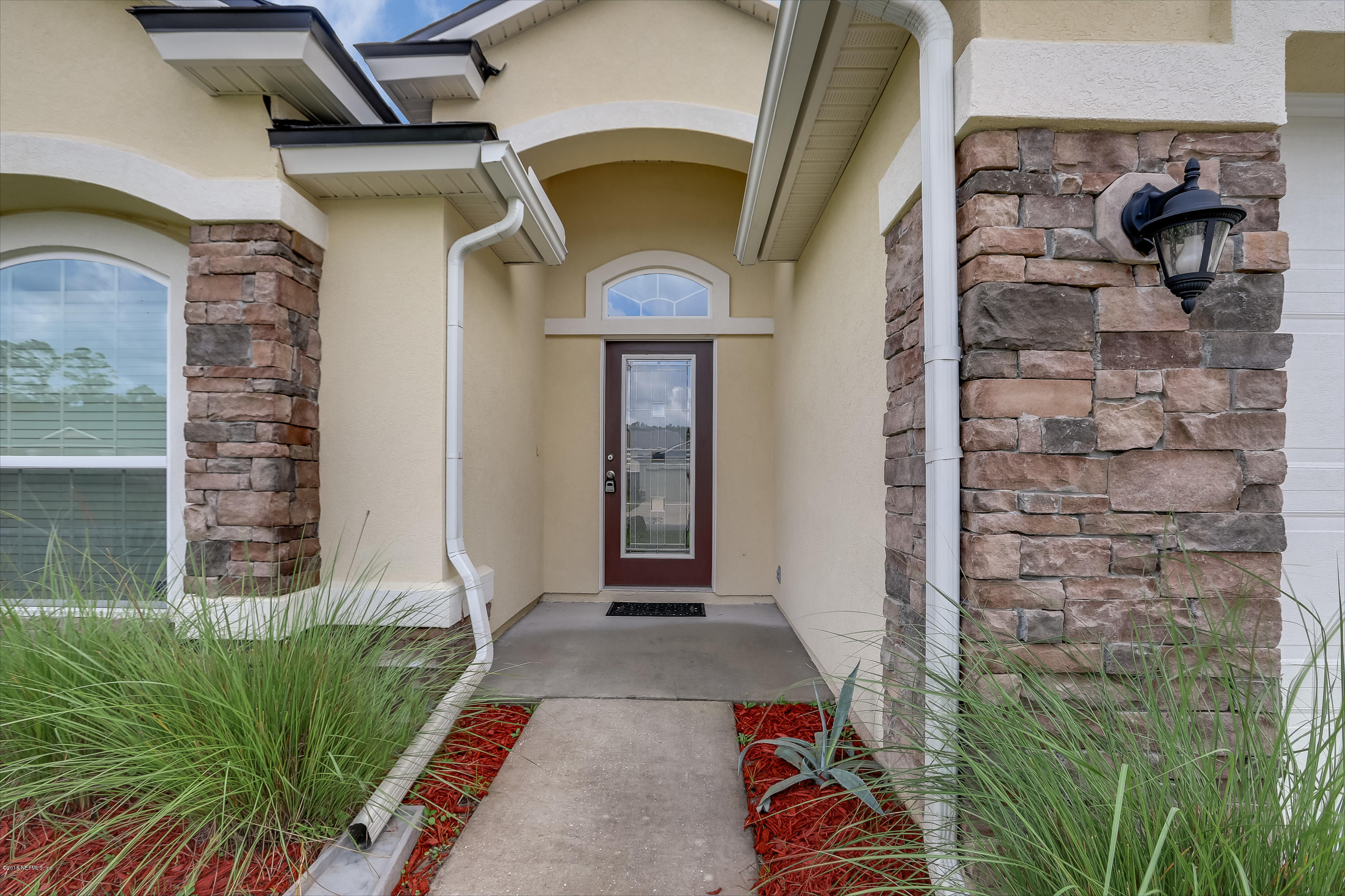 12143 Verde Gardens Road Jacksonville, FL 32218 - Photo 1 of 21 002_Entrance