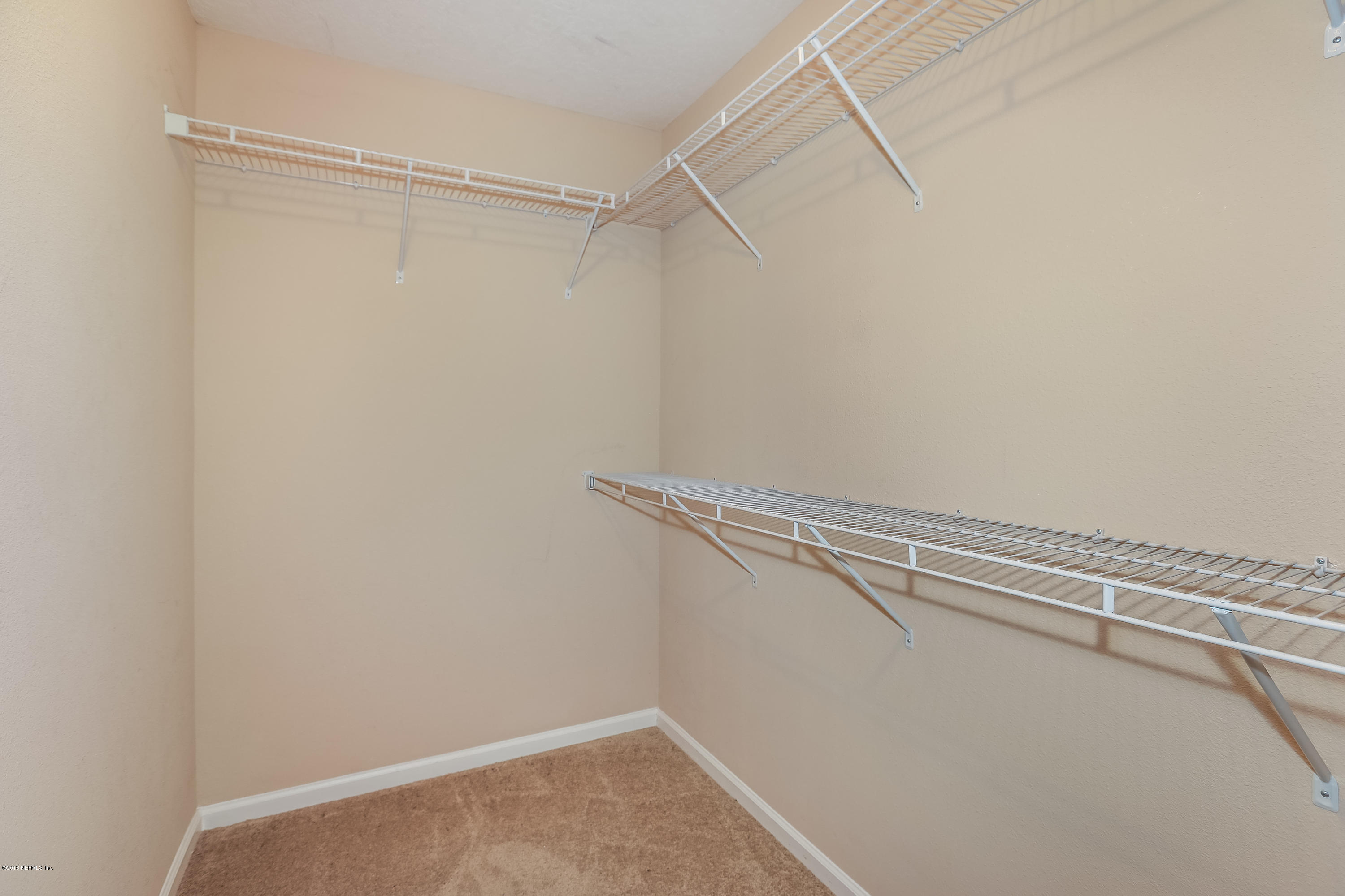12143 Verde Gardens Road Jacksonville, FL 32218 - Photo 14 of 21 016_Master Closet