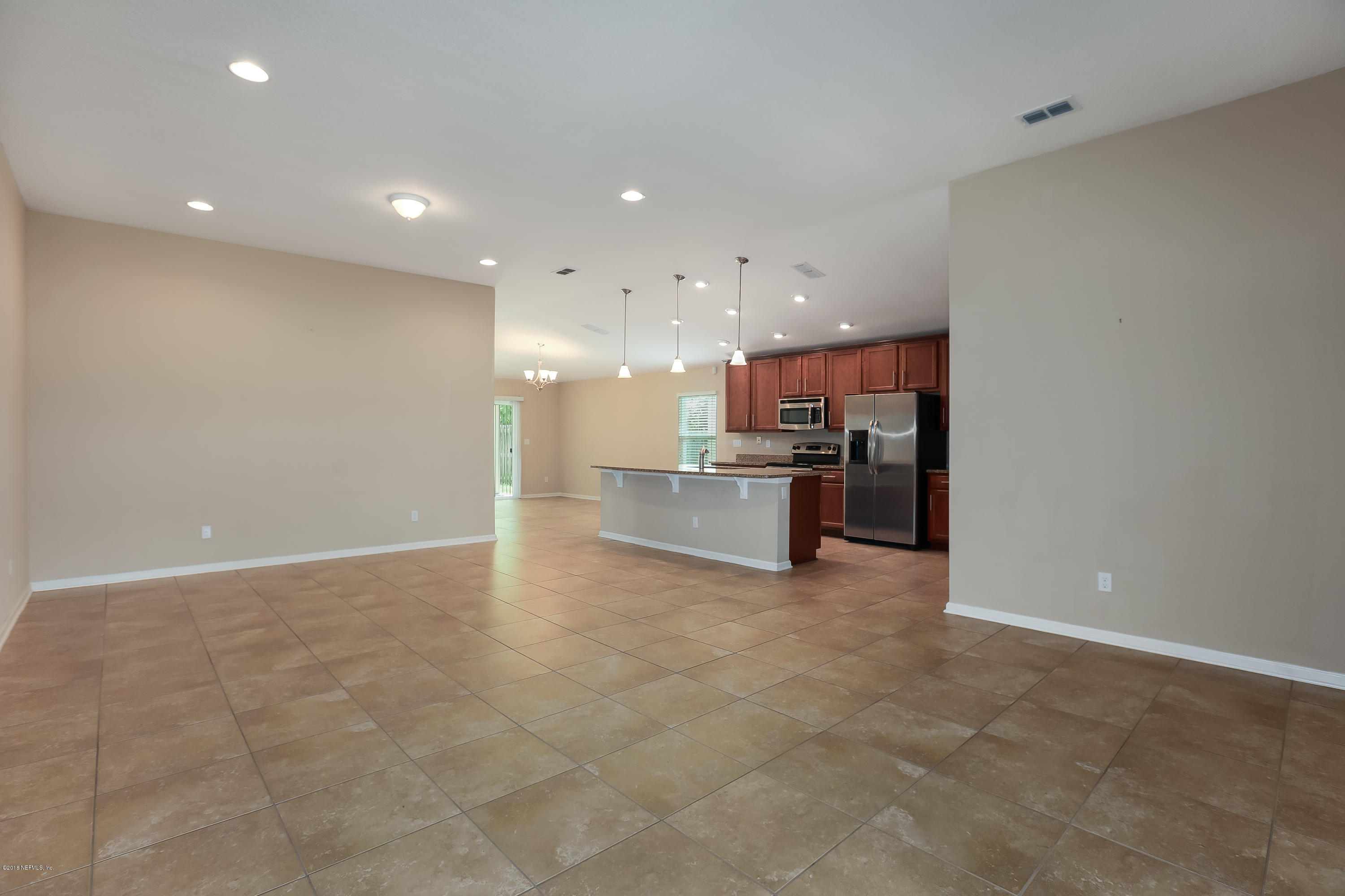 12143 Verde Gardens Road Jacksonville, FL 32218 - Photo 4 of 21 004_Family Room
