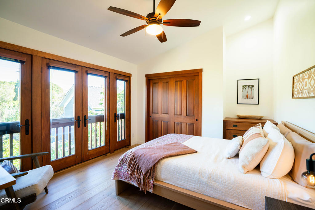 316 West Ortega Street, Unit B Santa Barbara, CA 93101 - Photo 15 of 19 a bedroom with a bed and a large window