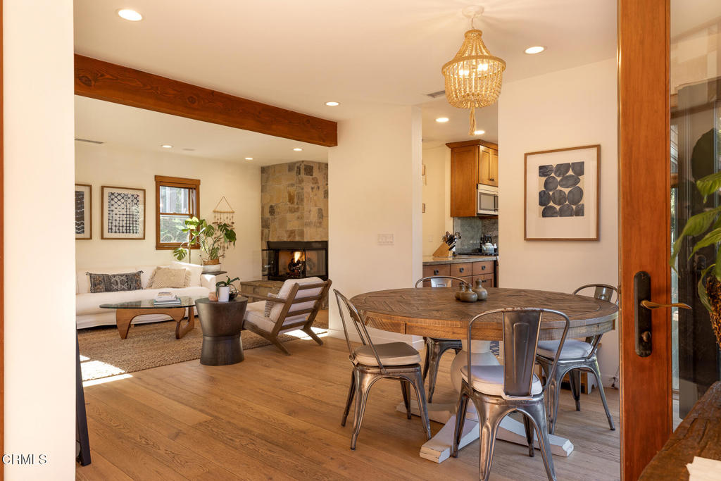 316 West Ortega Street, Unit B Santa Barbara, CA 93101 - Photo 3 of 19 a view of a dining room with furniture and a chandelier