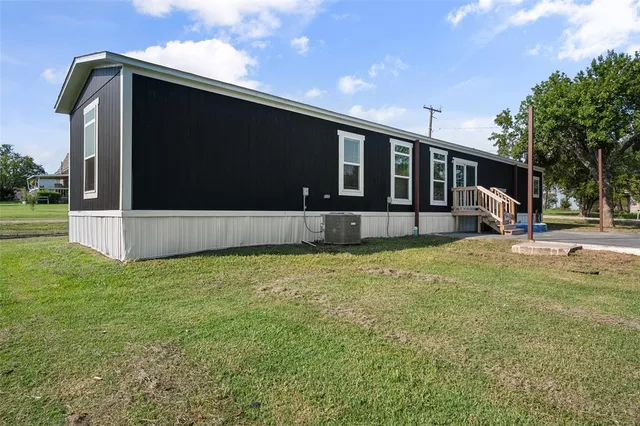 a front view of house with yard