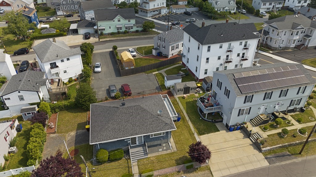 382 America Street Fall River, MA 02721 - Photo 9 of 25 an aerial view of residential houses with outdoor space
