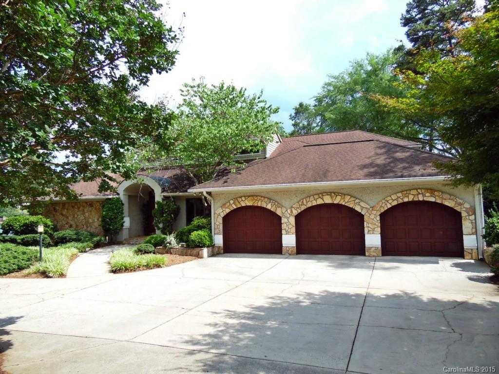 988 Cove Point Lane Tega Cay, SC 29708 - Photo 1 of 22 a front view of a house with yard and parking