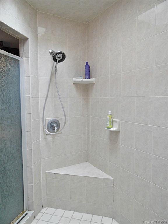 988 Cove Point Lane Tega Cay, SC 29708 - Photo 12 of 22 a bathroom with a shower