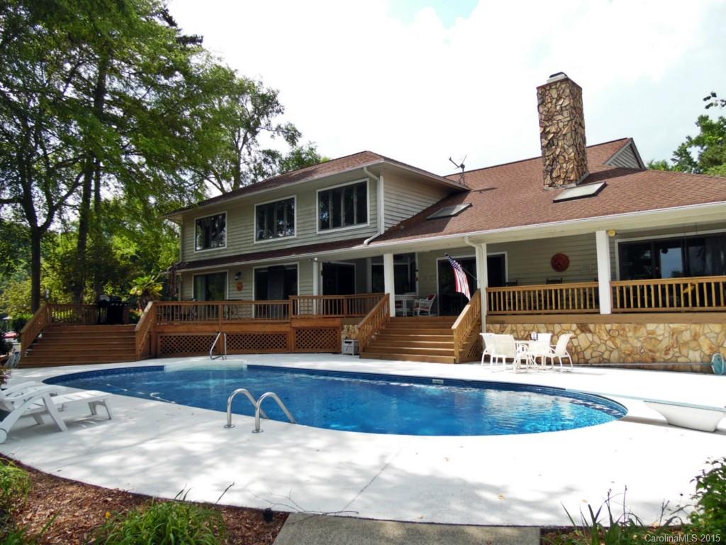 988 Cove Point Lane Tega Cay, SC 29708 - Photo 17 of 22 a front view of a house with swimming pool