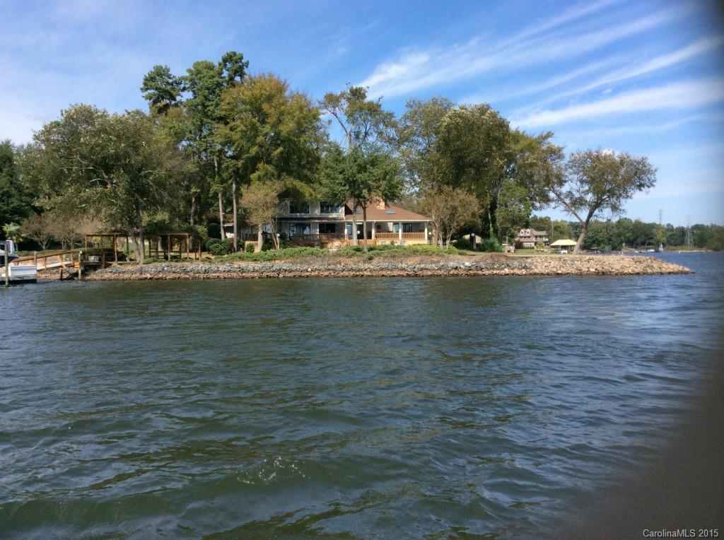 988 Cove Point Lane Tega Cay, SC 29708 - Photo 20 of 22 a view of a lake with houses