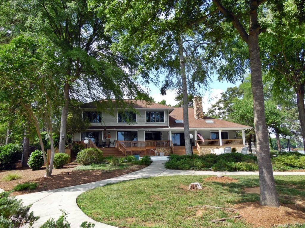 988 Cove Point Lane Tega Cay, SC 29708 - Photo 21 of 22 front view of a house with a yard