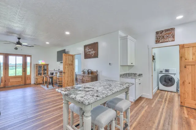 a view of a kitchen and dining room
