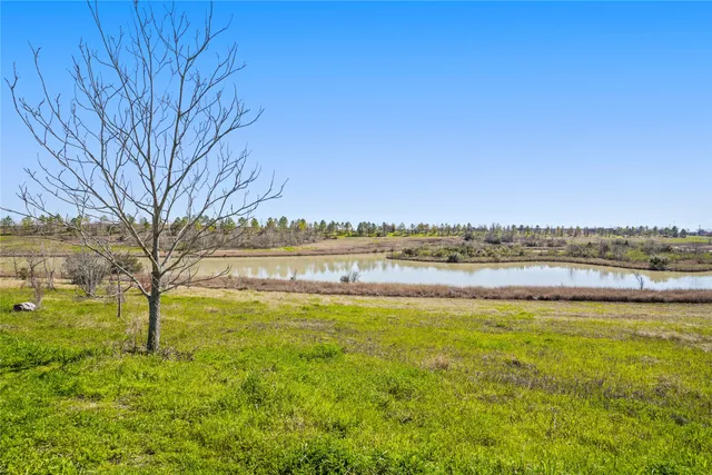 a street view with parking and sign board