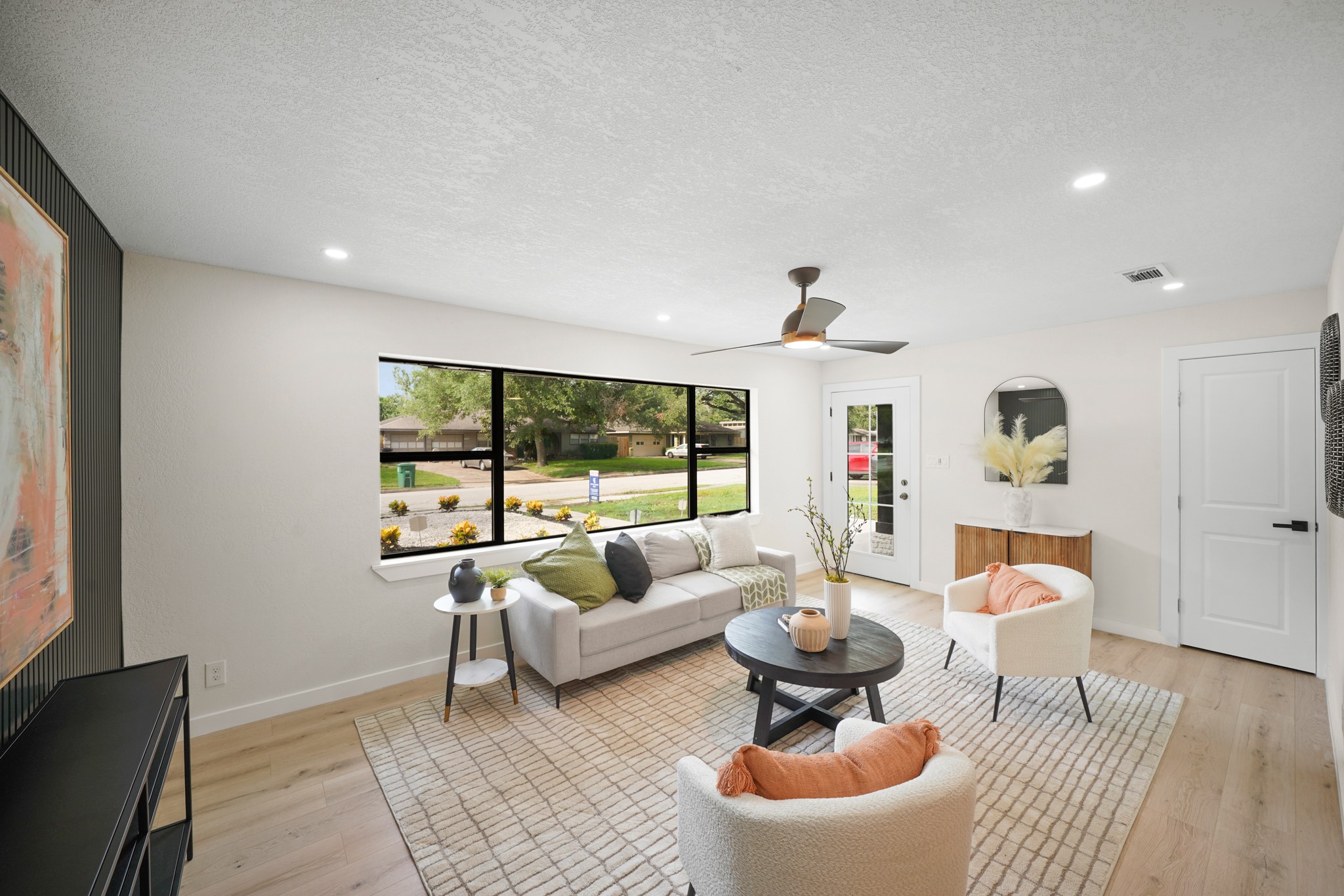4813 Hummingbird Street Houston, TX 77035 - Photo 5 of 50 a living room with furniture and a large window