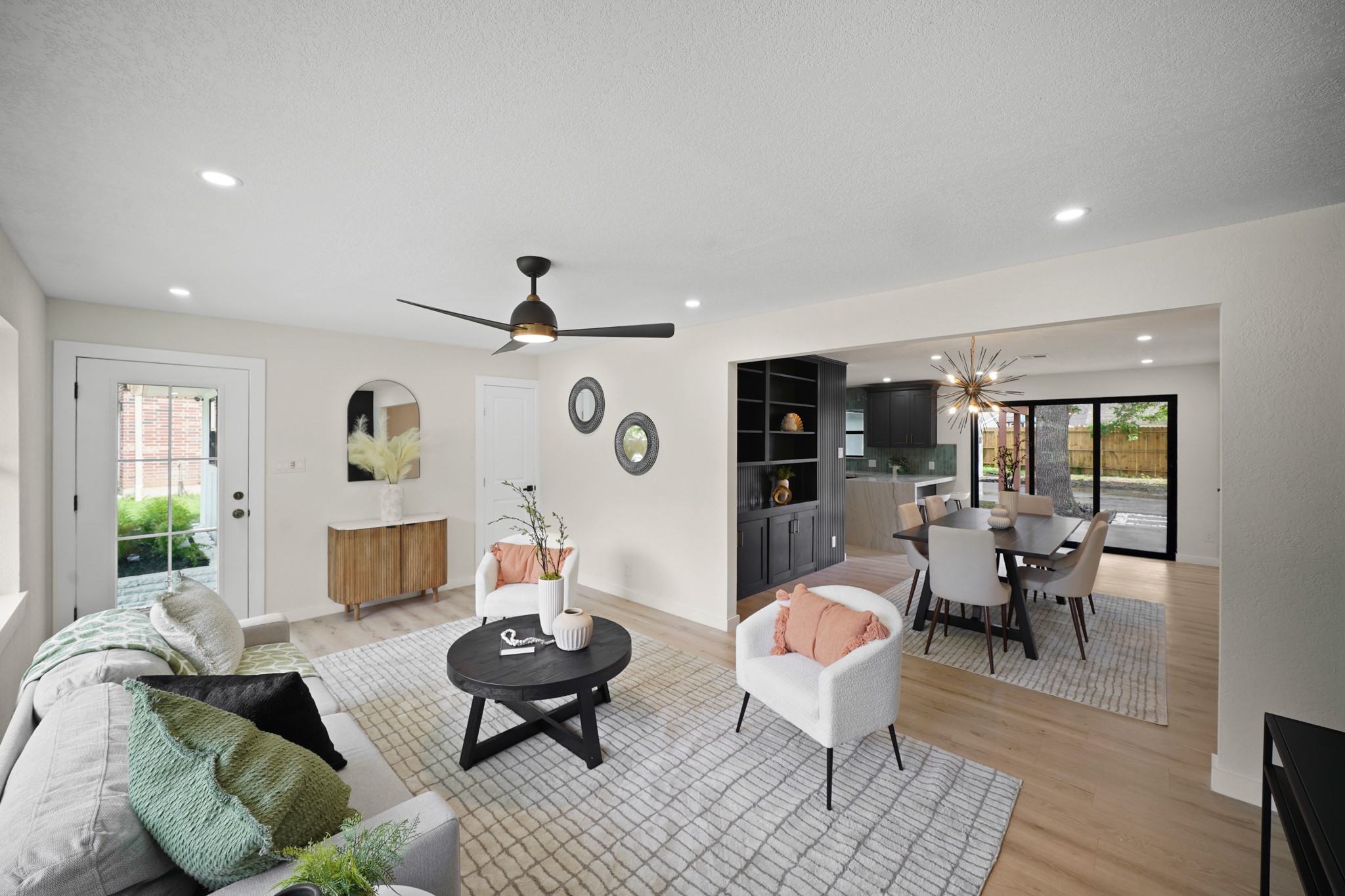 4813 Hummingbird Street Houston, TX 77035 - Photo 46 of 50 a living room with furniture and wooden floor