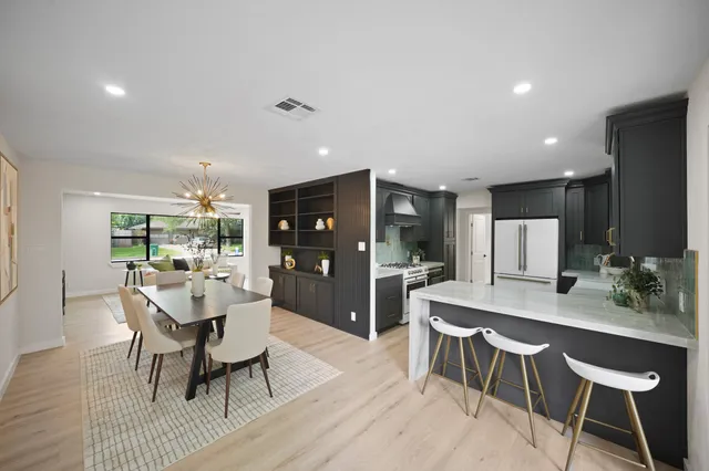 a view of a park with large trees