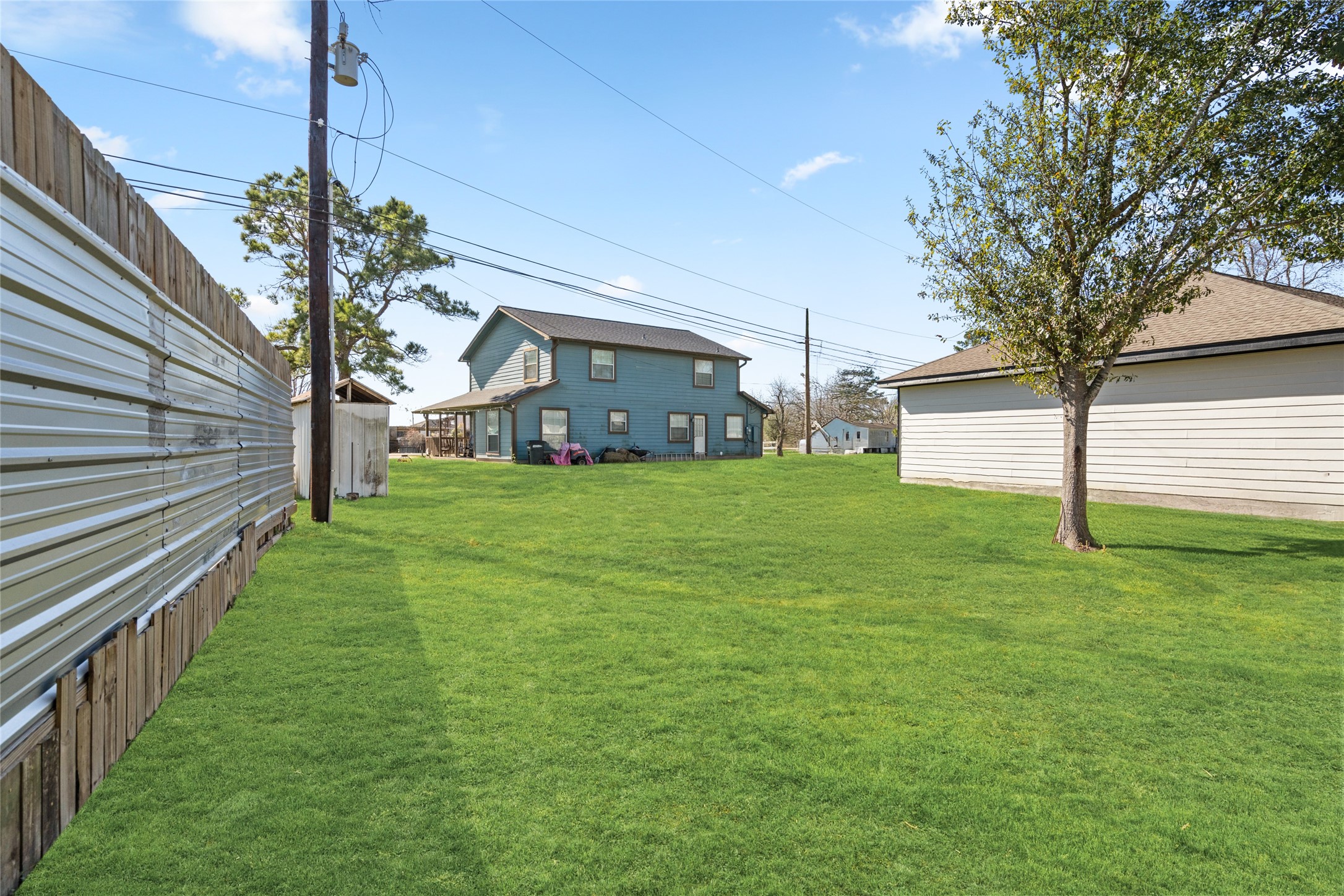 4656 North Teague Street Rosharon, TX 77583 - Photo 39 of 41 Deep backyard space ready for a patio, garden, or future outdoor upgrades.
