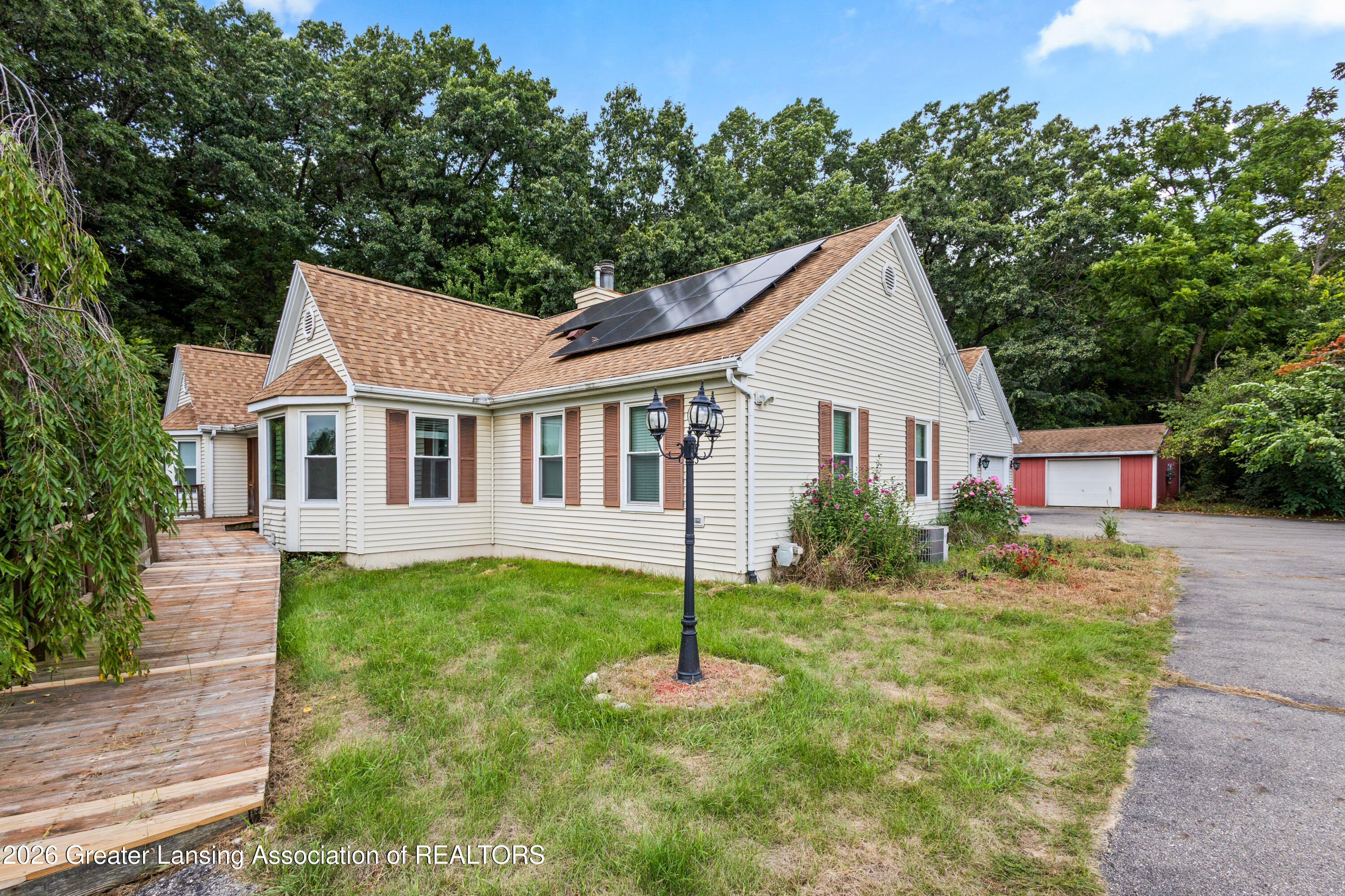 1335 East Round Lake Road Dewitt, MI 48820 - Photo 2 of 83 ROUND LAKE-65