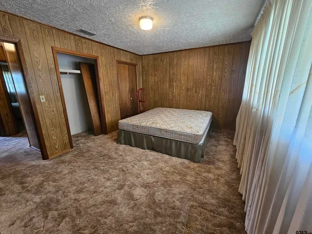 a bathroom with a toilet and a sink