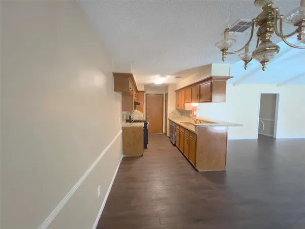 a view of a kitchen with a sink
