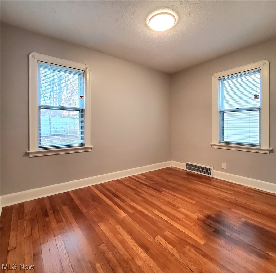 4348 Prasse Road South Euclid, OH 44121 - Photo 7 of 10 First-floor bedroom #2, with a refinished wood floor